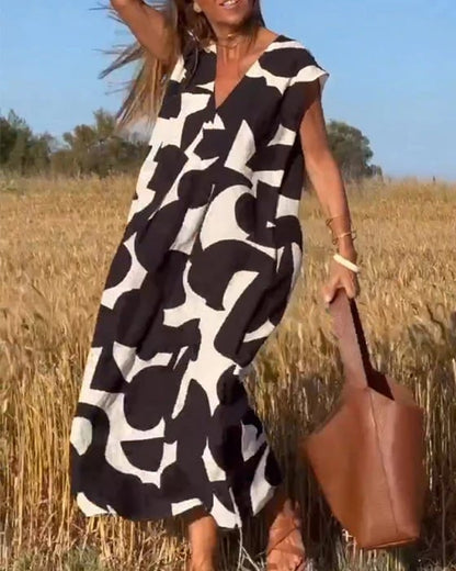 💕 Αμάνικο εμπριμέ φόρεμα με λαιμόκοψη V